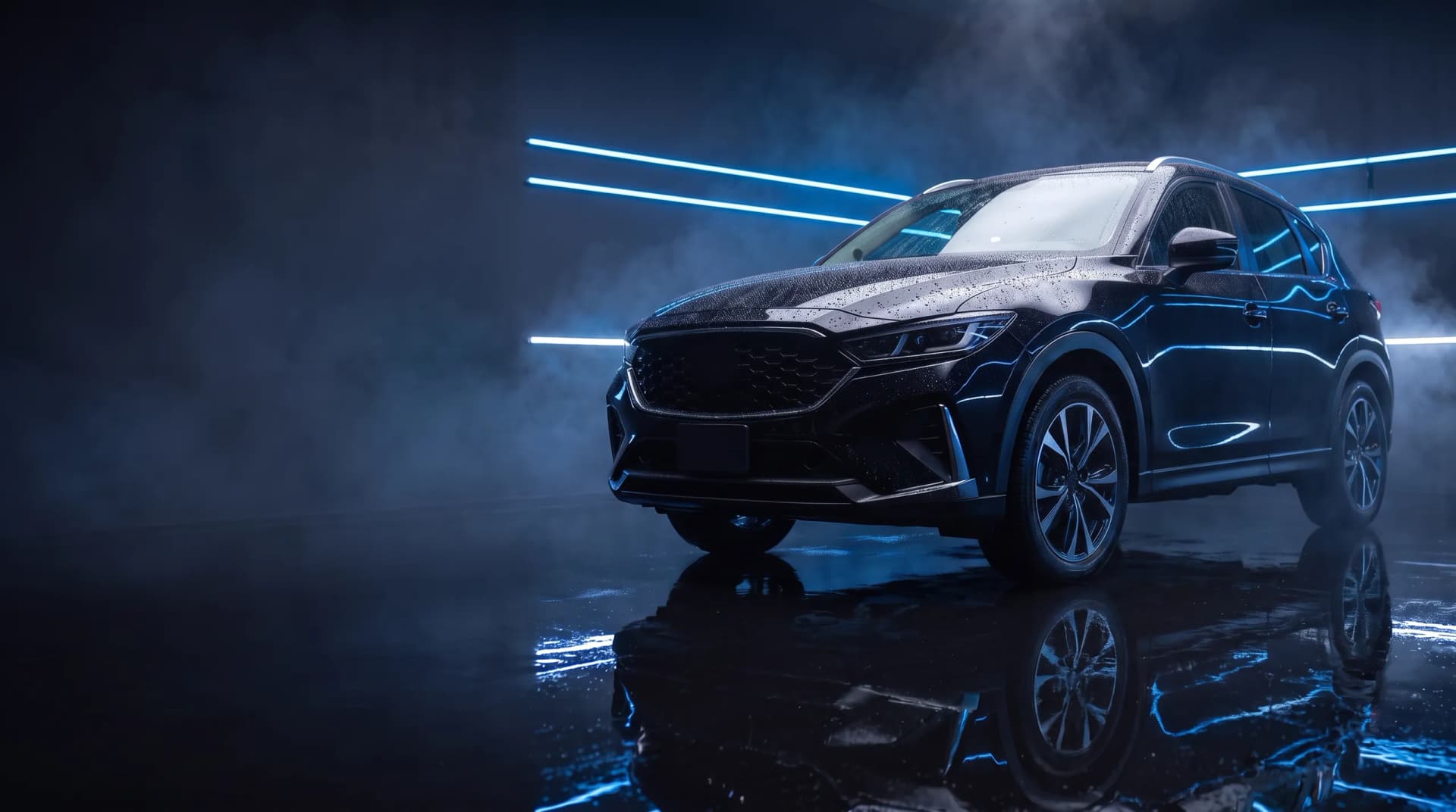 SUV negro con pintura brillante y gotas de agua en un estudio de detailing con luces azules